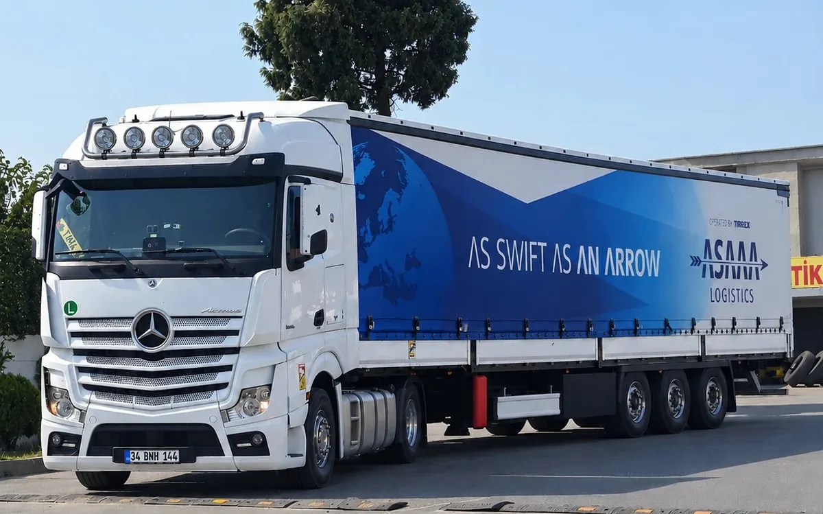 ASAAA Logistics truck with branded trailer
